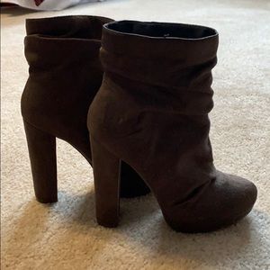 Tall brown booties. Thick heel.